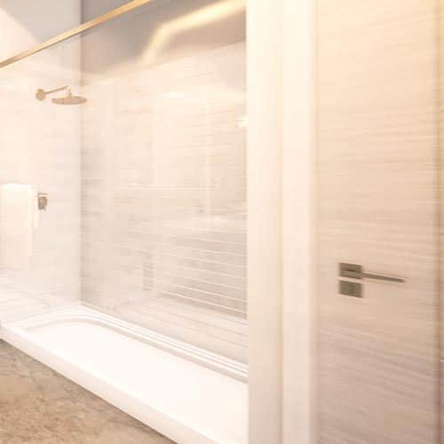 Image 12 completes the bathroom tour by rotating over to the right for a better view of the shower. Right side of a white bathroom containing the spacious, modern shower